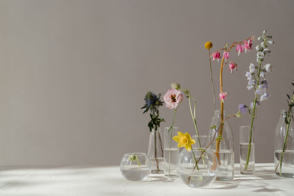 Jasmine flower arrangement in glass vase